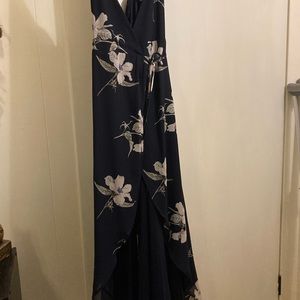 Lulus navy wrap around high low dress. Has adjustable straps. No rips or tears.